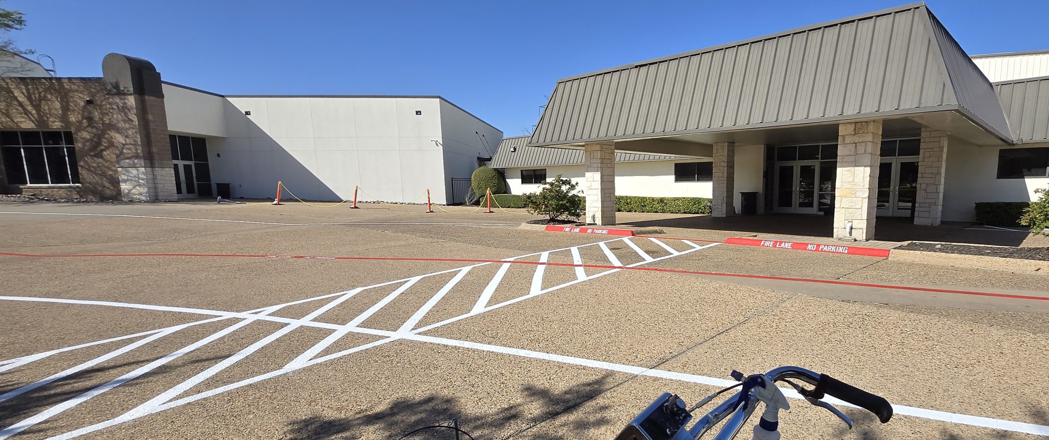 Crosswalk striping on a commercial parking lot