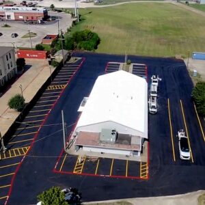 High-traffic parking lot sealcoat and striping