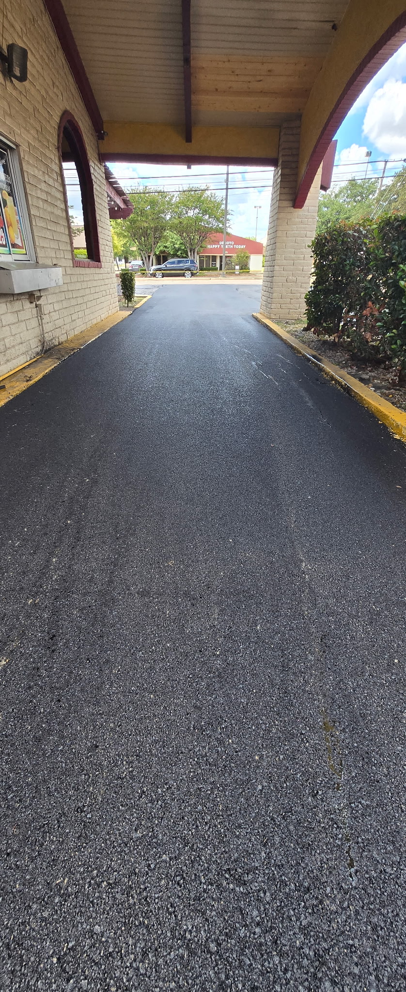 Drum roller on a commercial asphalt paving project