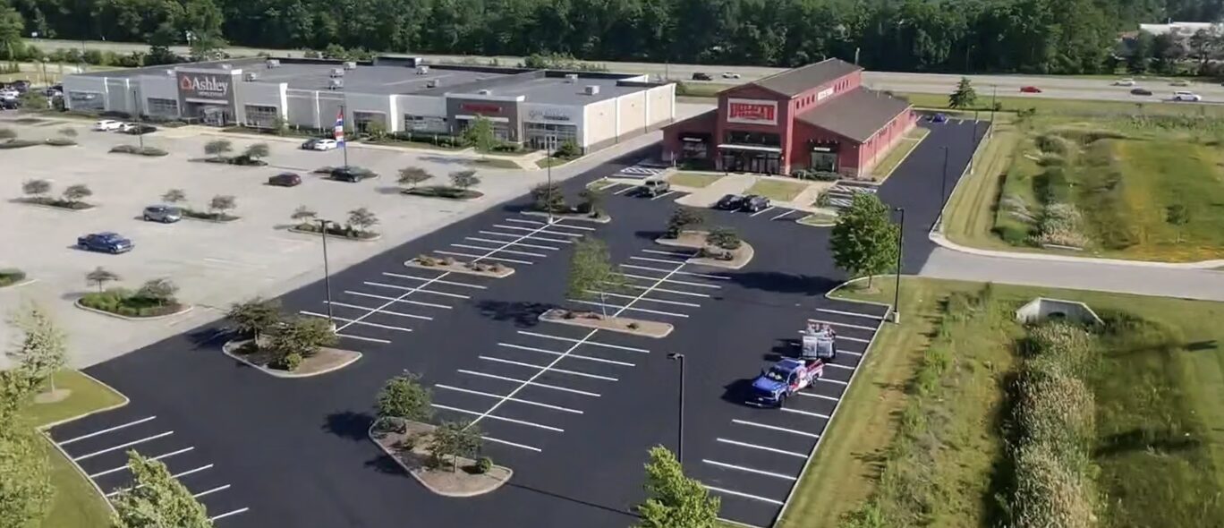 Sealcoating and parking lot striping for a premier upscale clothing company.