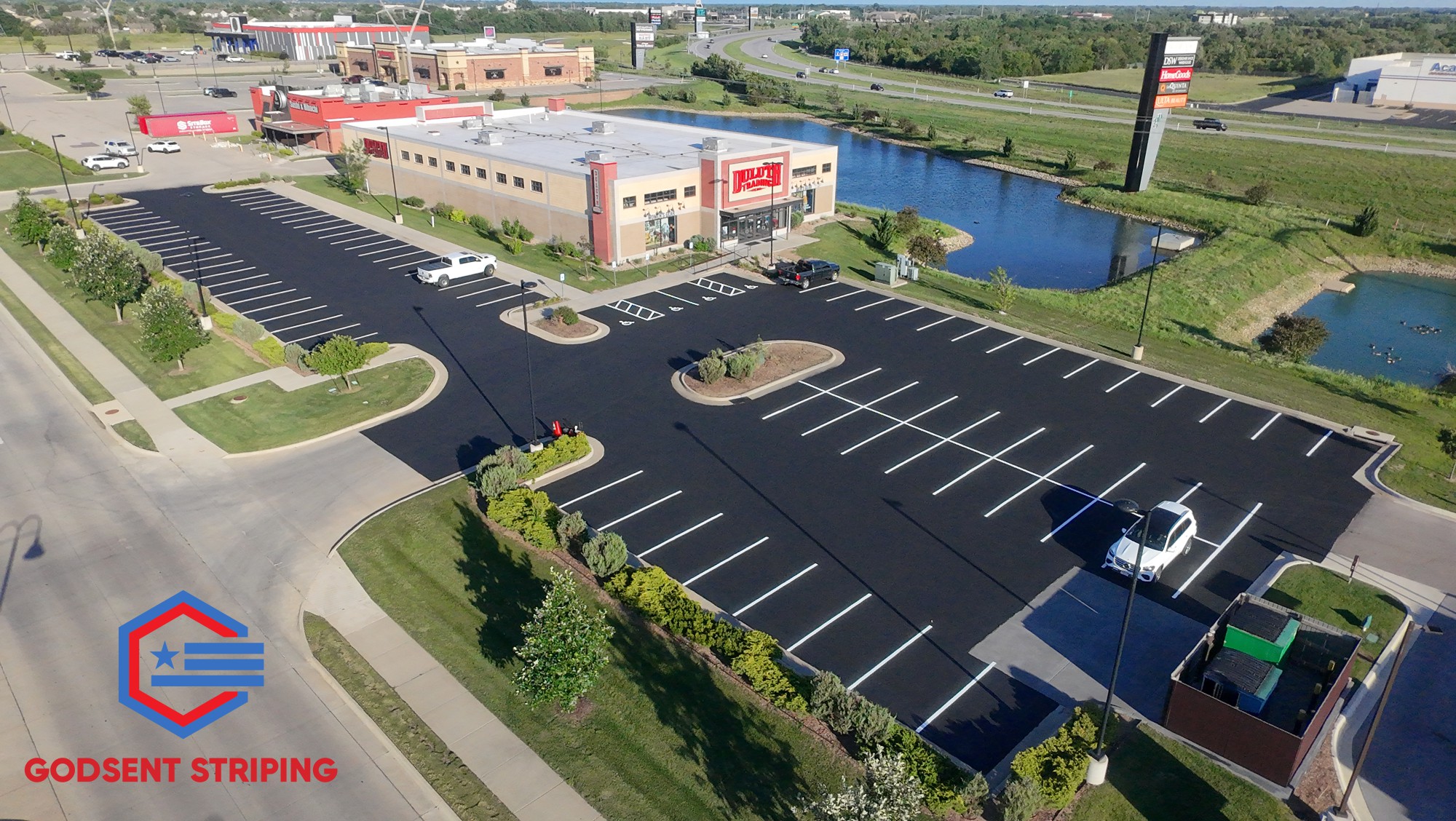 Sealcoating a premier upscale clothing retailer's parking lot